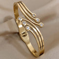 Gold Plated Flowing Lines Crystal Bangle